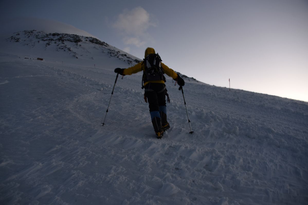 02A Guide Liza Pahl Leads The Way Up The Steep Trail To The Traverse With Mount Elbrus East Summit Above Before Sunrise